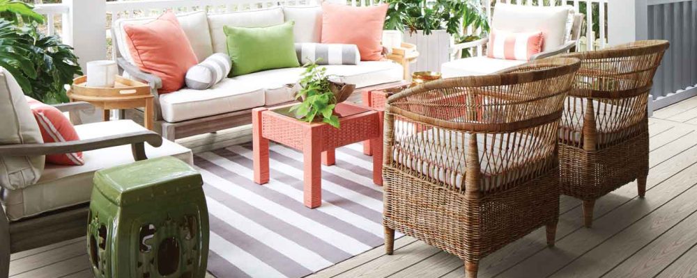 Refine your space with the balanced hues of Slate Gray decking from the TimberTech Advanced PVC Harvest Collection®. White Premier Rail from the Classic Composite Series and White AZEK Trim as fascia lend a clean, elegant finish.